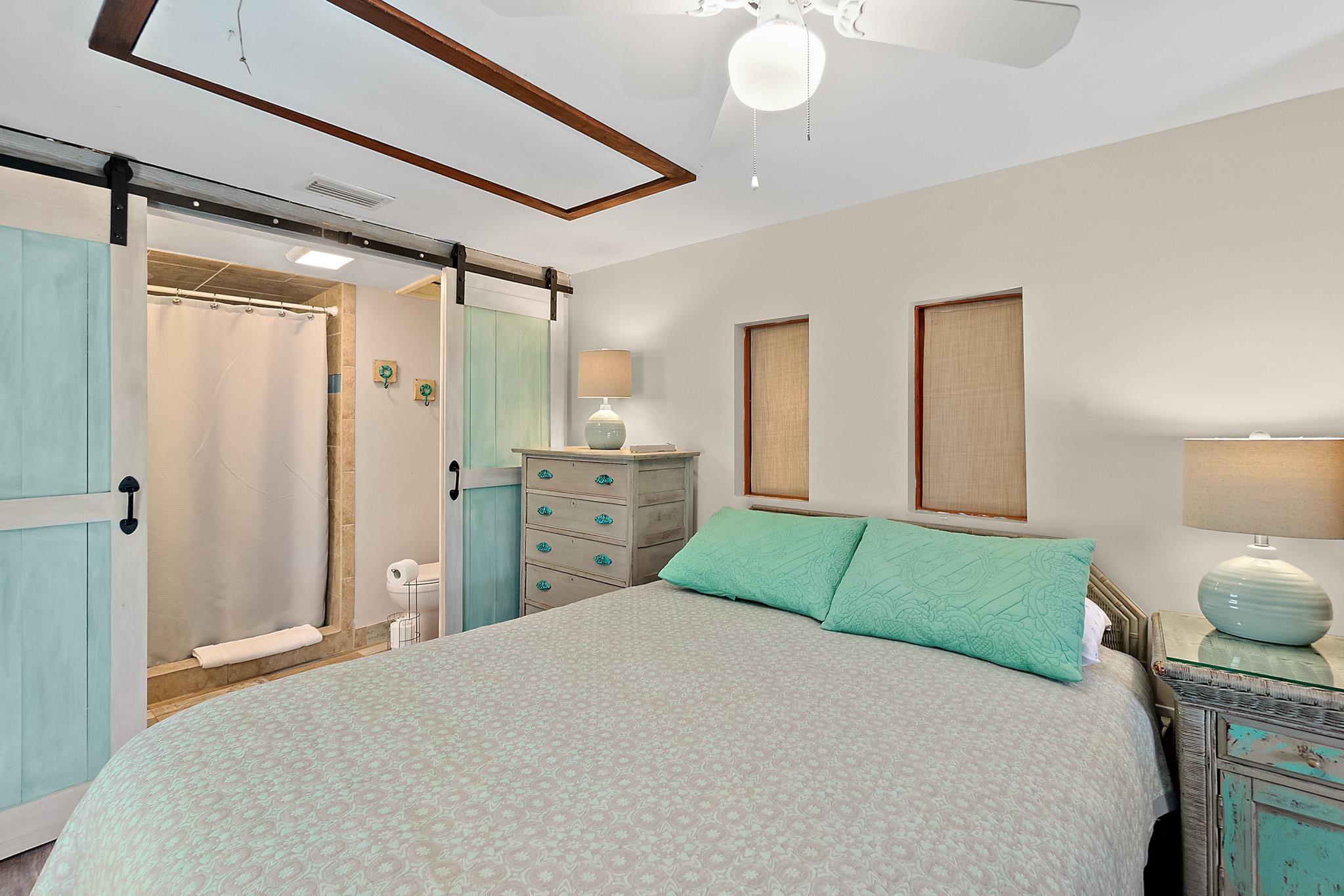 51 Beachcomber Way St. Augustine, FL 32084 - Photo 12 of 46 a bedroom with a bed and a refrigerator