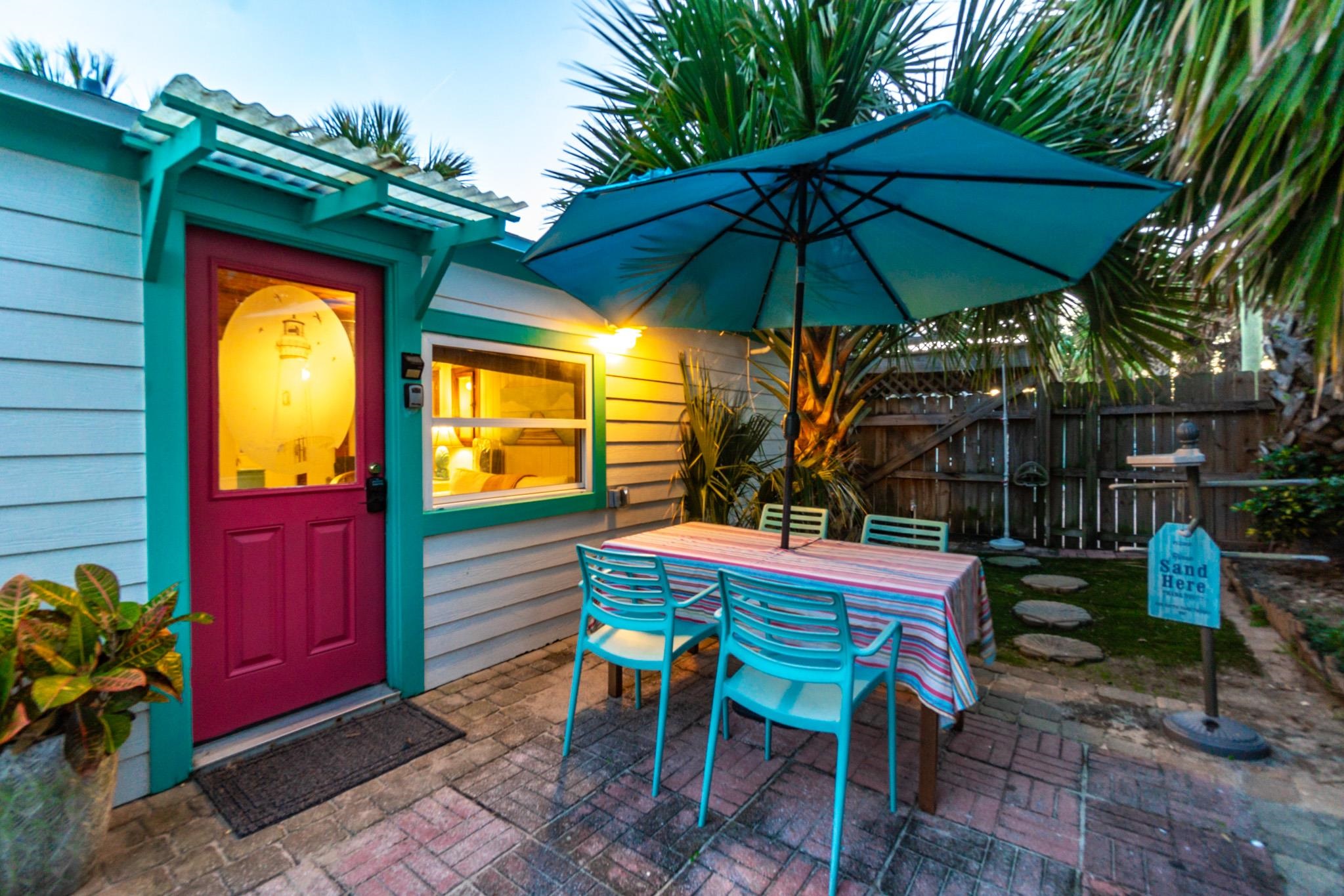 51 Beachcomber Way St. Augustine, FL 32084 - Photo 40 of 46 a view of an outdoor sitting area with brick walls