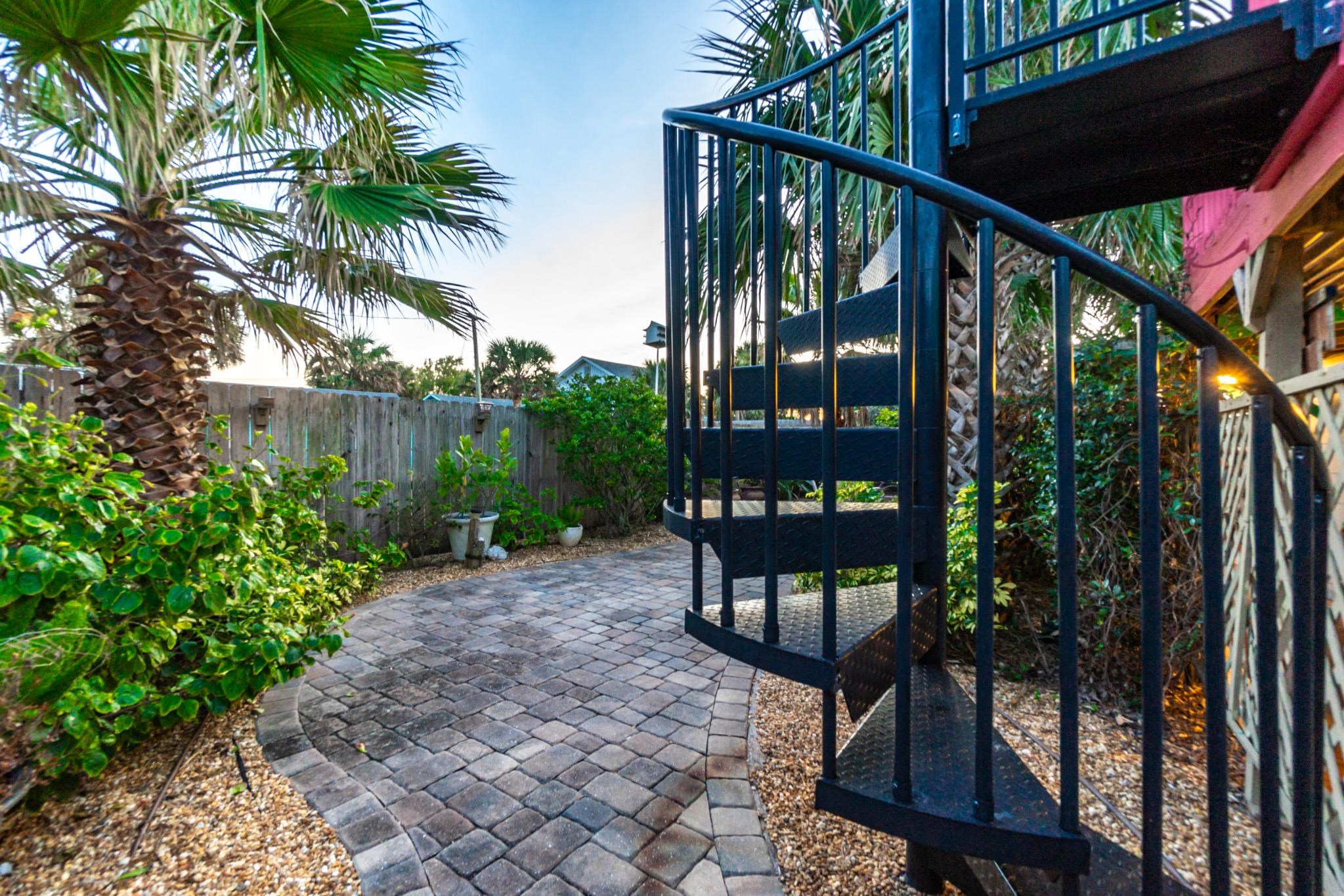 51 Beachcomber Way St. Augustine, FL 32084 - Photo 45 of 46 a view of a porch with a table and chairs