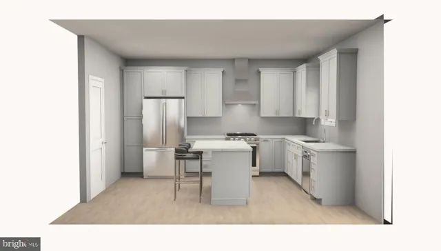 a kitchen with a sink cabinets and stainless steel appliances