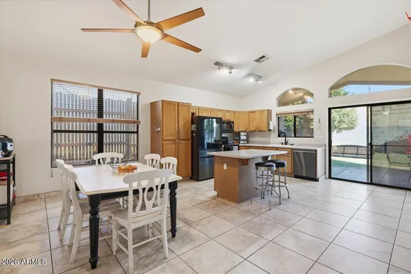 a view of a dining room kitchen and a window