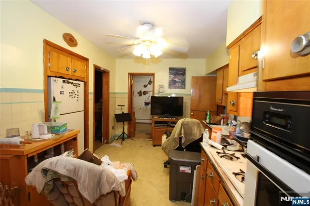 a bedroom with furniture and a fireplace