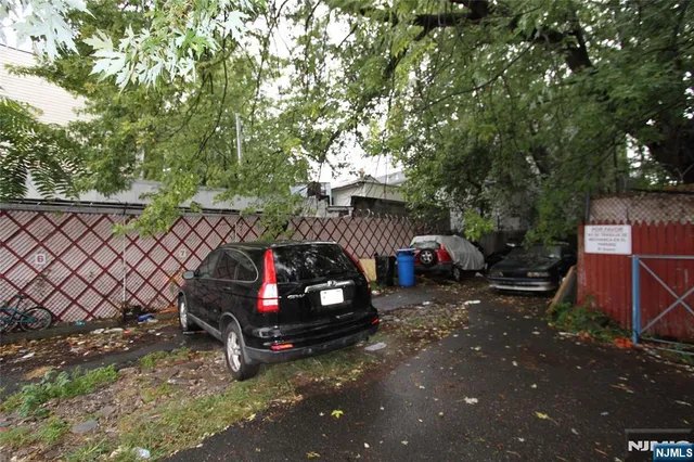 a view of a house with a back yard