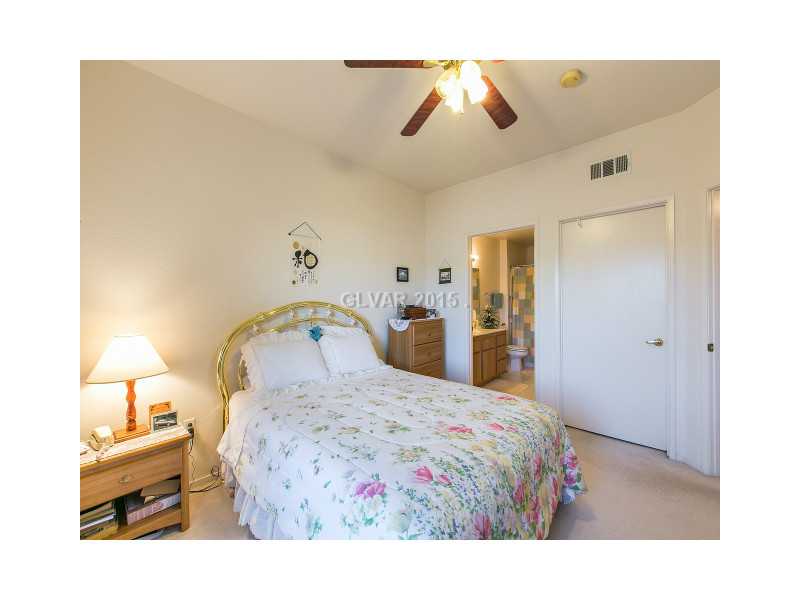 1881 West Alexander Road, Unit 1100 North Las Vegas, NV 89032 - Photo 16 of 23 Master Bedroom.