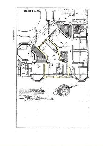 a black and white photo of a living room