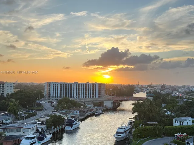 a view of a street with cars