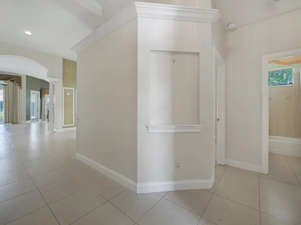 a view of a hallway with closet area