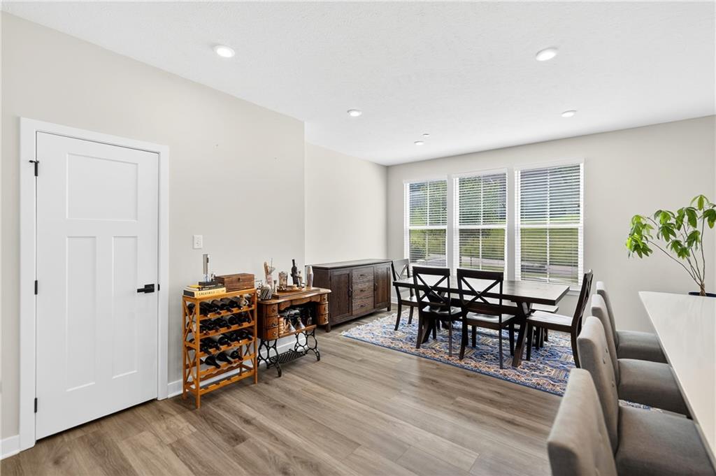 124 Rivulet Place Zelienople, PA 16063 - Photo 9 of 41 Luxury Vinyl Plank Flooring Throughout Main Level.