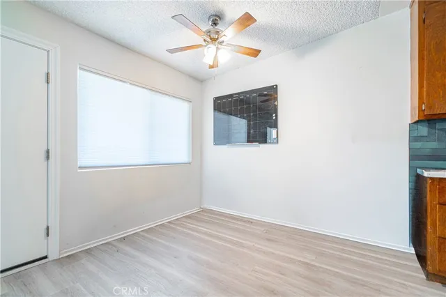 a view of kitchen with wooden floor