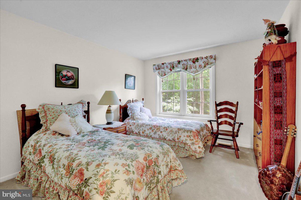 586 Berwyn Baptist Road Devon, PA 19333 - Photo 44 of 49 a bedroom with bed and a window