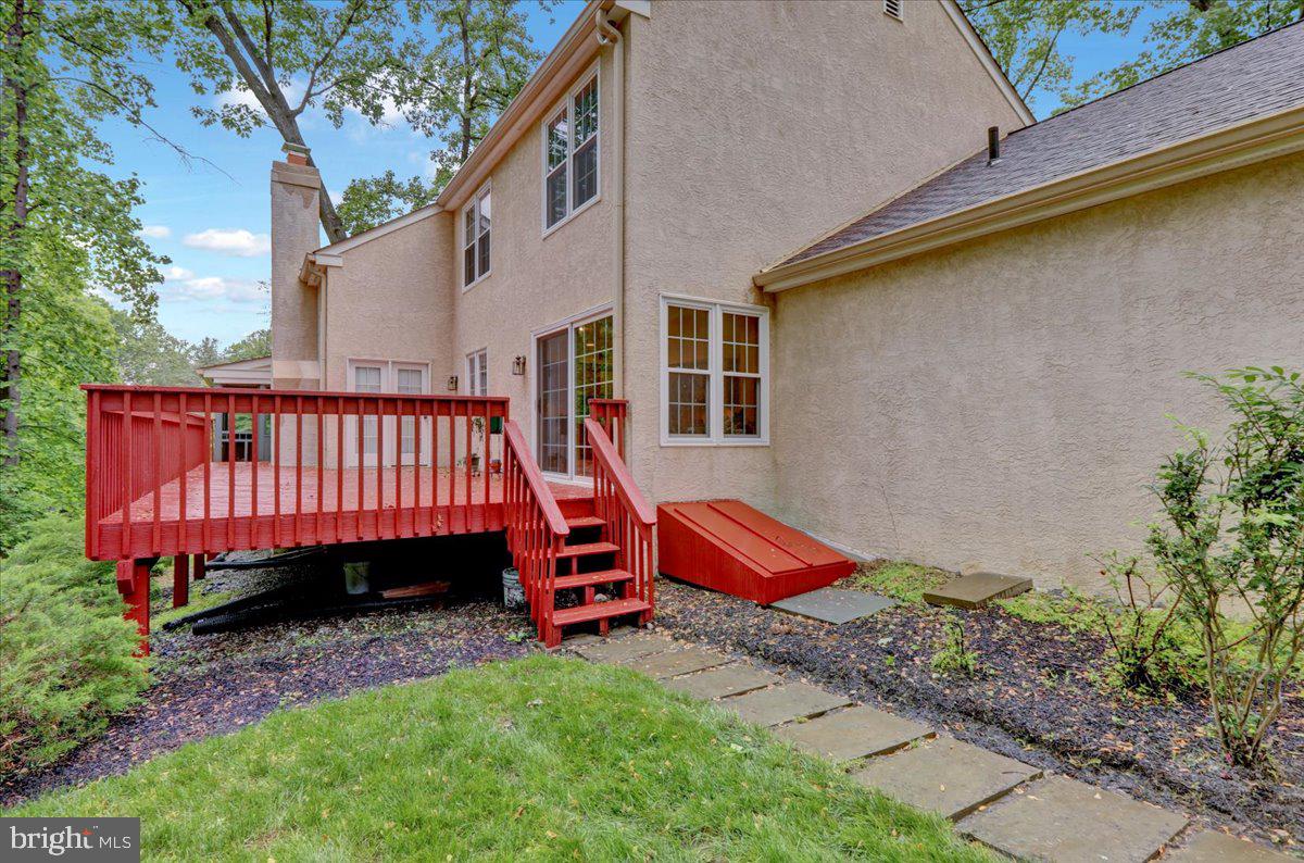 586 Berwyn Baptist Road Devon, PA 19333 - Photo 9 of 49 a backyard of a house with a yard fire pit and outdoor seating
