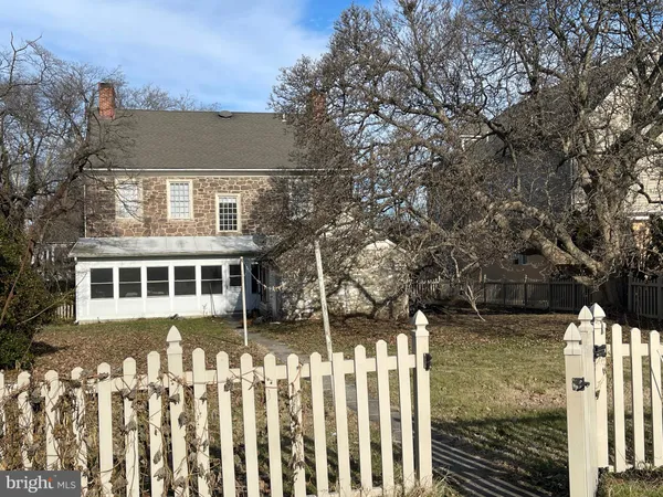 a front view of house with a yard