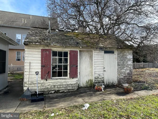 a front view of a house with garage