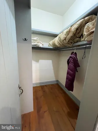 a view of a bathroom with a sink and a shower