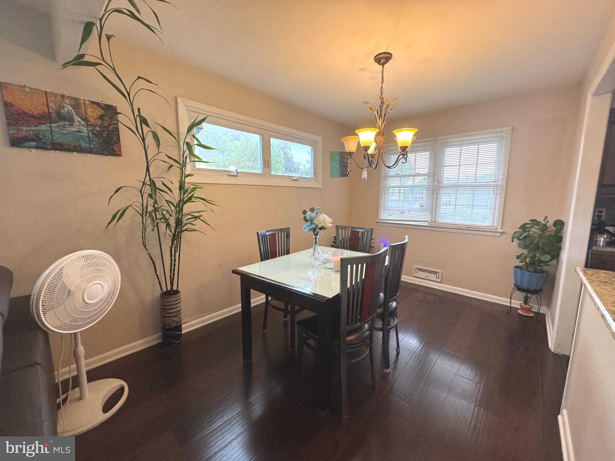 100 Winding Way Hamilton, NJ 08620 - Photo 6 of 9 a view of a dining room with furniture window and wooden floor