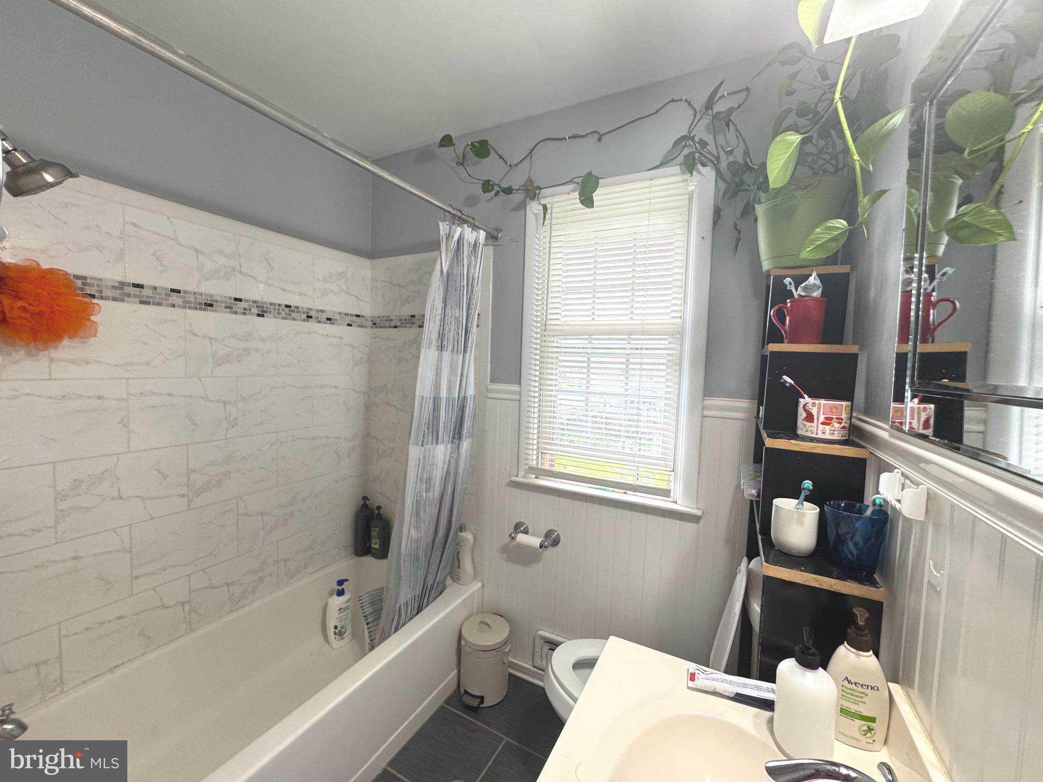 100 Winding Way Hamilton, NJ 08620 - Photo 8 of 9 a bathroom with a sink and a mirror