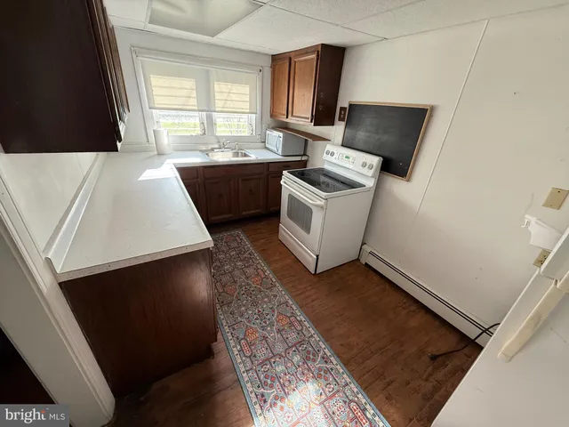 a living room with a couch and a flat screen tv