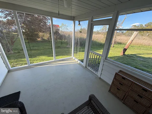 a view of an outdoor space with a large window