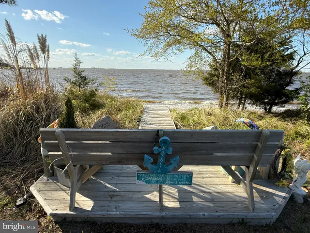 a view of a street with tall building