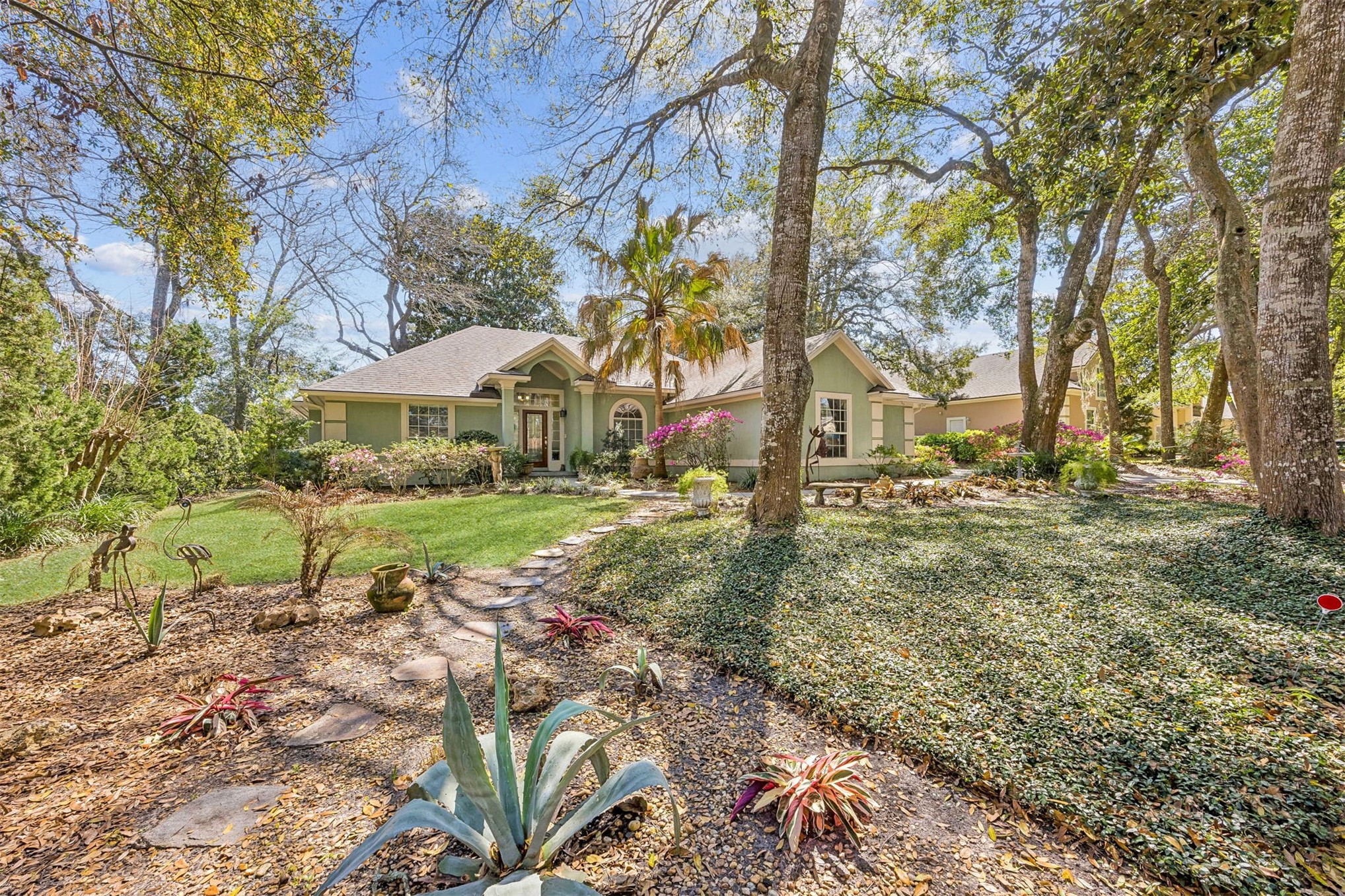 95406 Captains Way Fernandina Beach, FL 32034 - Photo 5 of 51 The front elevation has a warm, understated presence that feels inviting from the start.