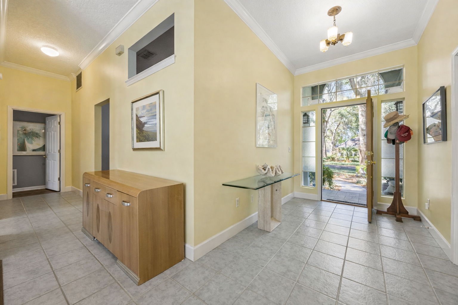 95406 Captains Way Fernandina Beach, FL 32034 - Photo 9 of 51 Inside, a bright foyer welcomes you with the airy, light-filled feel carried throughout the home.