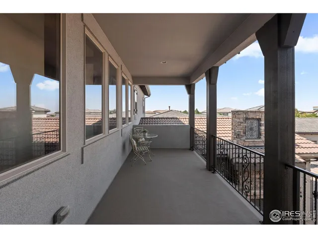 a view of a swimming pool and a yard