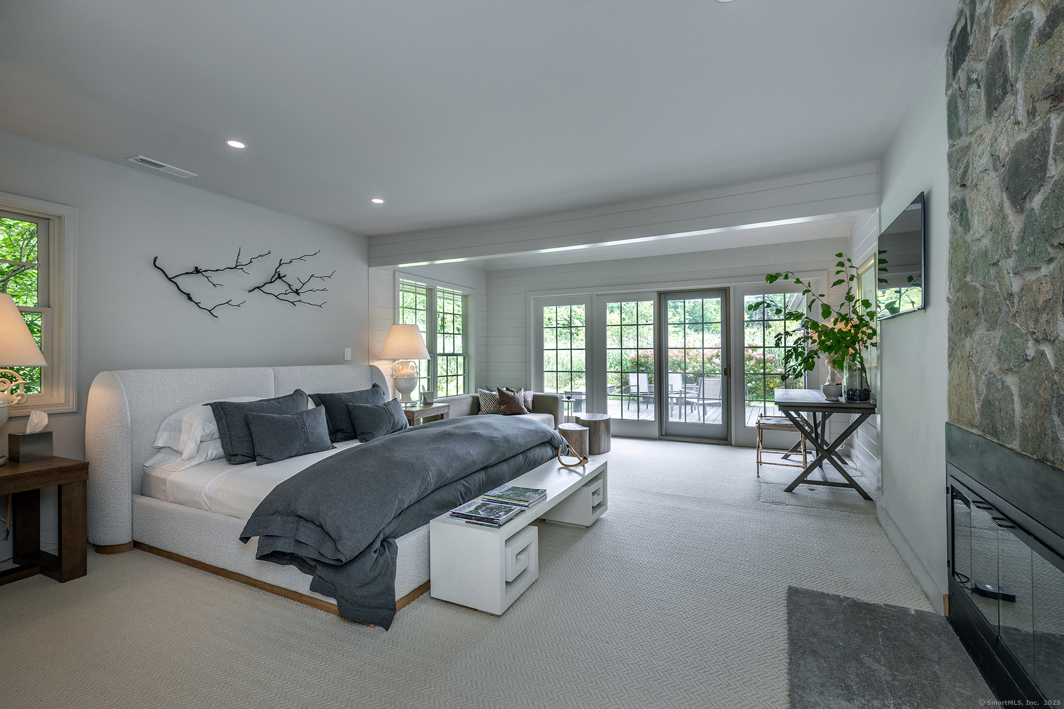 15 Herrick Road Sharon, CT 06069 - Photo 16 of 39 a living room with furniture and a large window