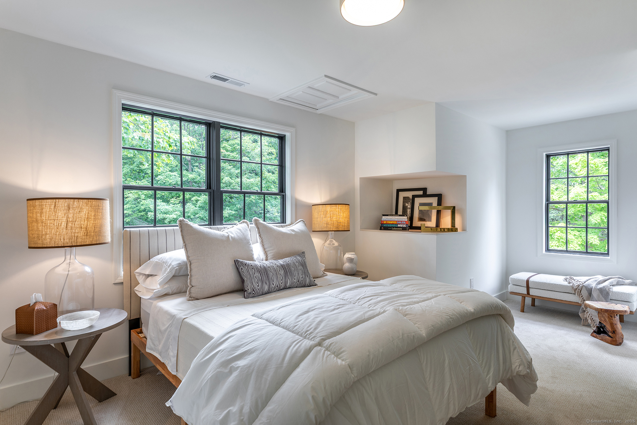 15 Herrick Road Sharon, CT 06069 - Photo 25 of 39 a bedroom with a bed and a couch