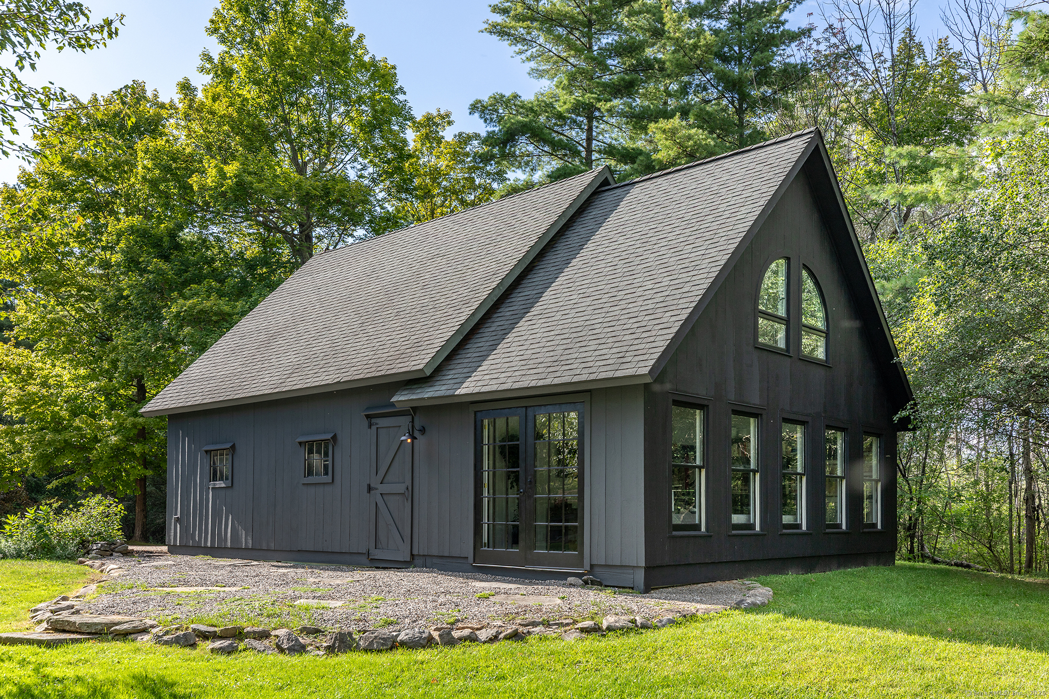 15 Herrick Road Sharon, CT 06069 - Photo 28 of 39 a house with garden in front of it