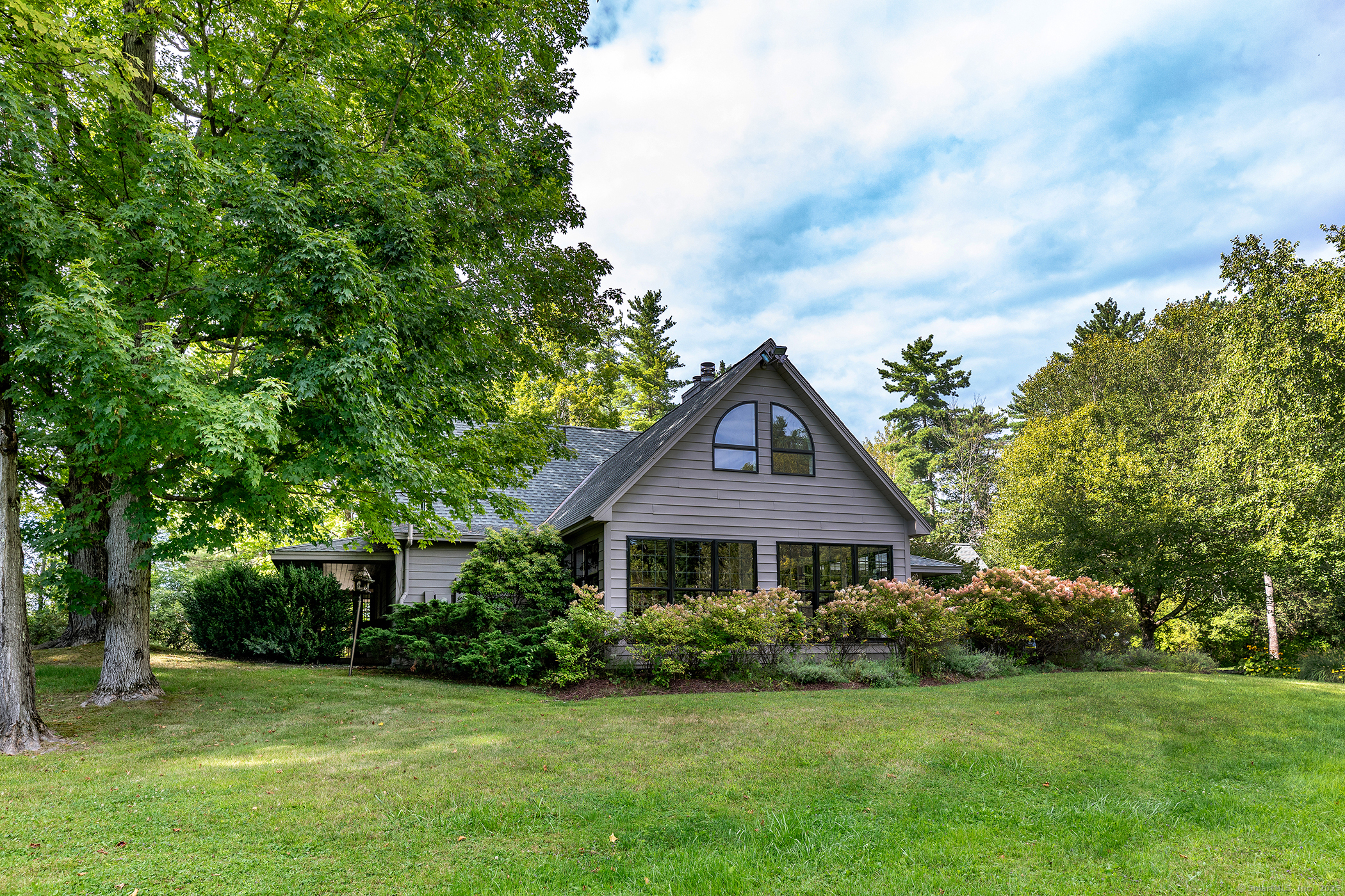 15 Herrick Road Sharon, CT 06069 - Photo 33 of 39 a front view of a house with garden