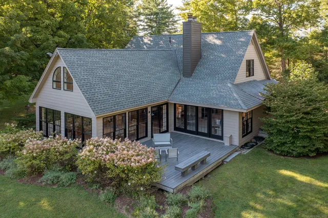 a front view of a house with swimming pool