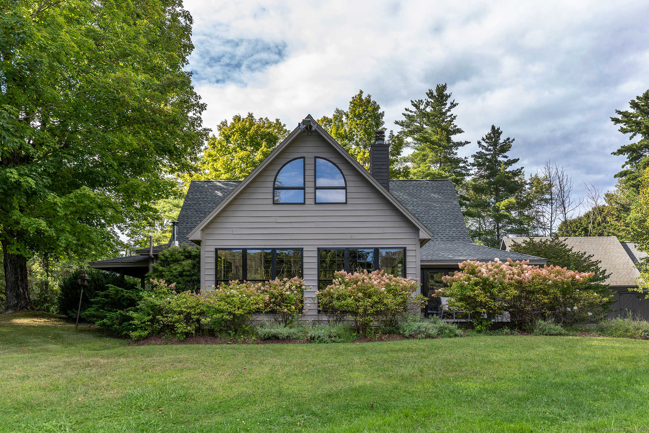15 Herrick Road Sharon, CT 06069 - Photo 35 of 39 a front view of a house with a yard