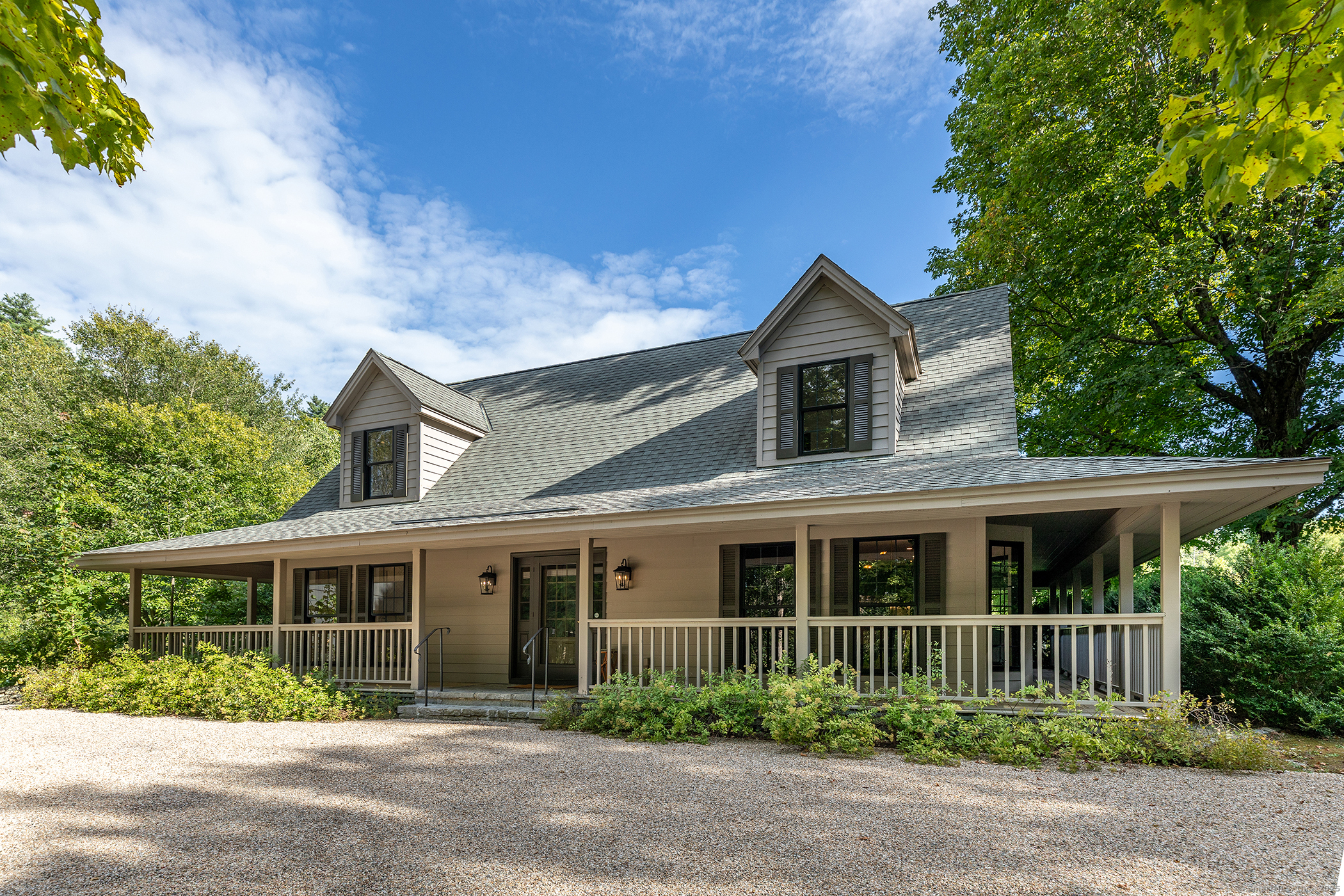 15 Herrick Road Sharon, CT 06069 - Photo 4 of 39 front view of a house with a garden