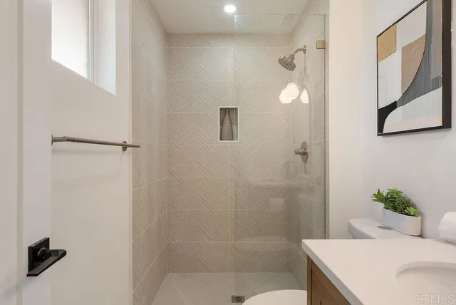 a bathroom with a sink and mirror