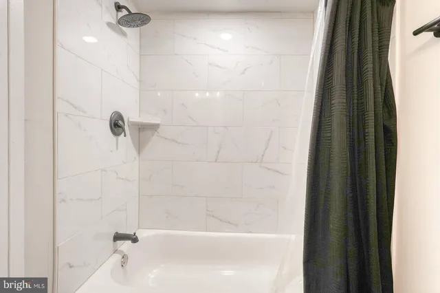 a bathroom with a bathtub