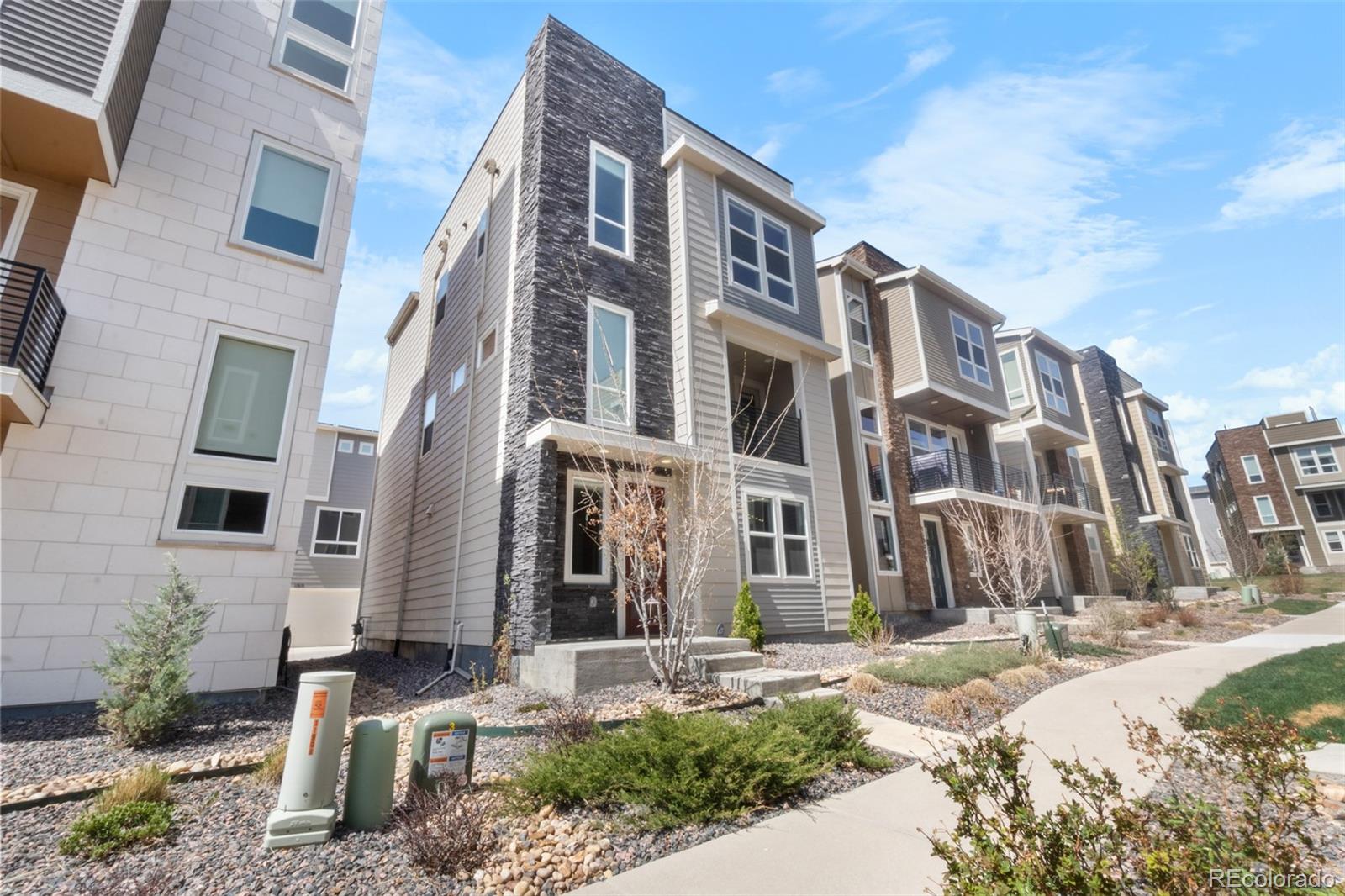 a front view of a multi story residential apartment building