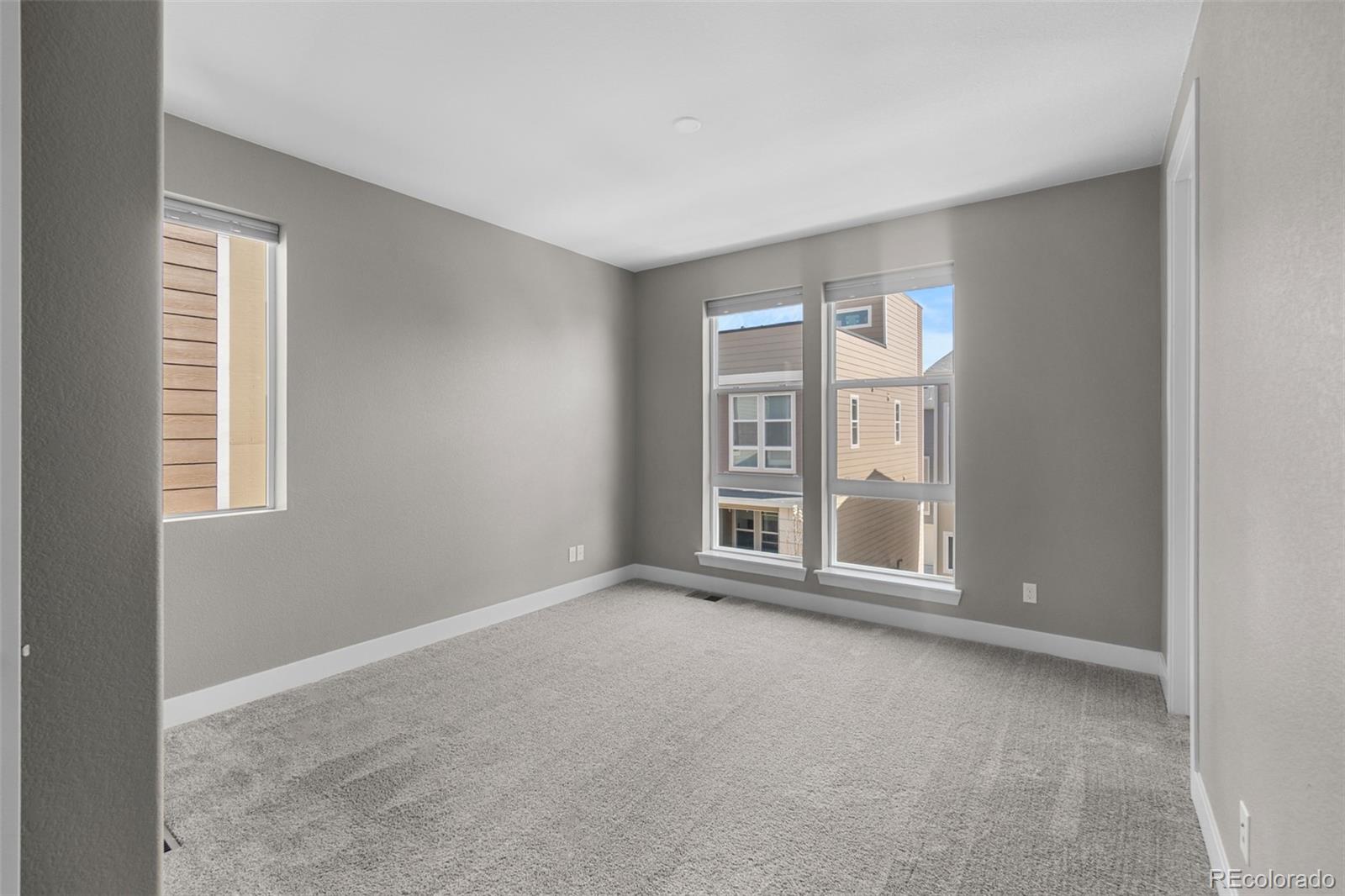 11918 Mountview Lane Broomfield, CO 80021 - Photo 20 of 32 a view of an empty room with a window