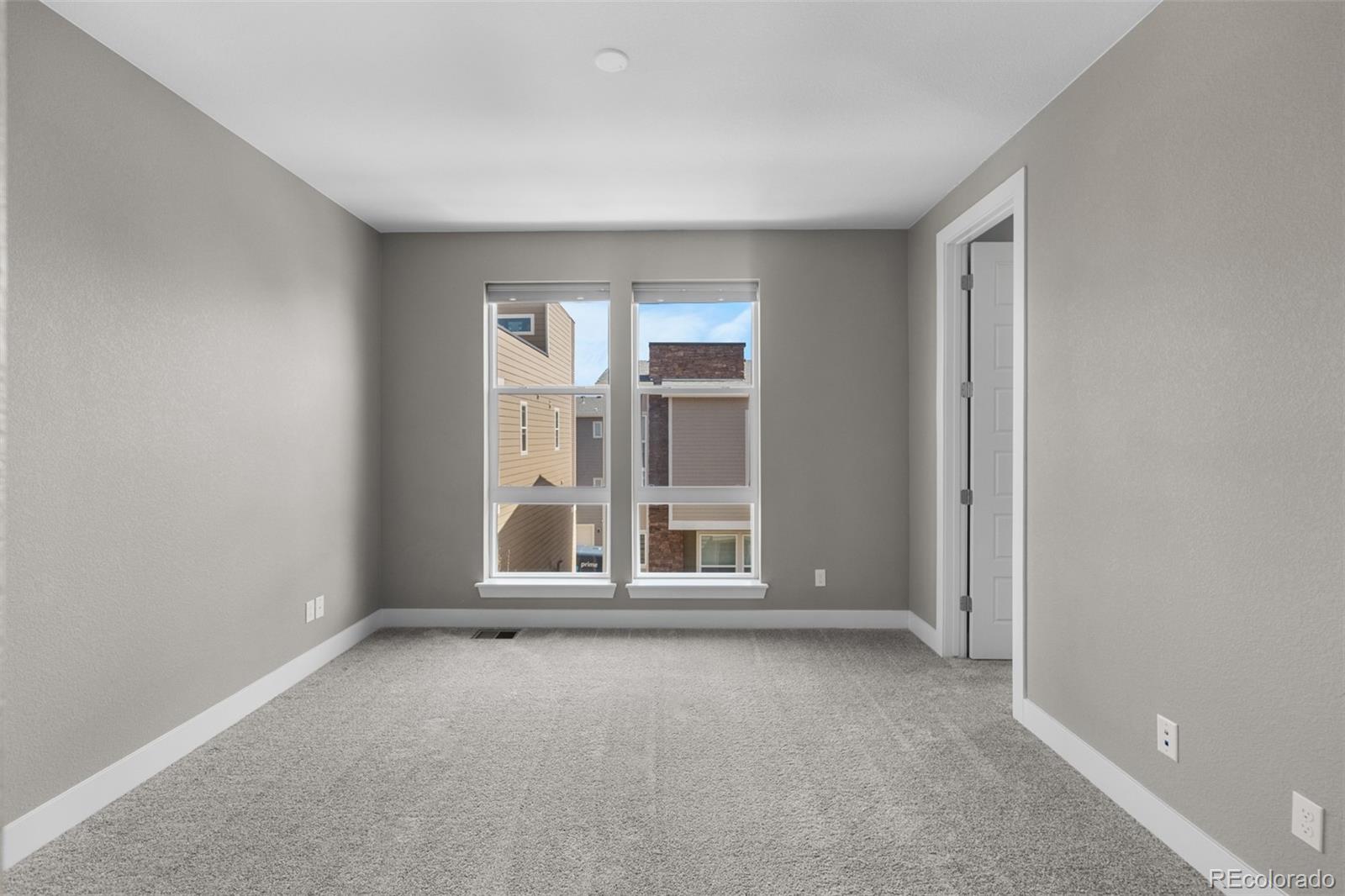 11918 Mountview Lane Broomfield, CO 80021 - Photo 22 of 32 a view of an empty room with a window