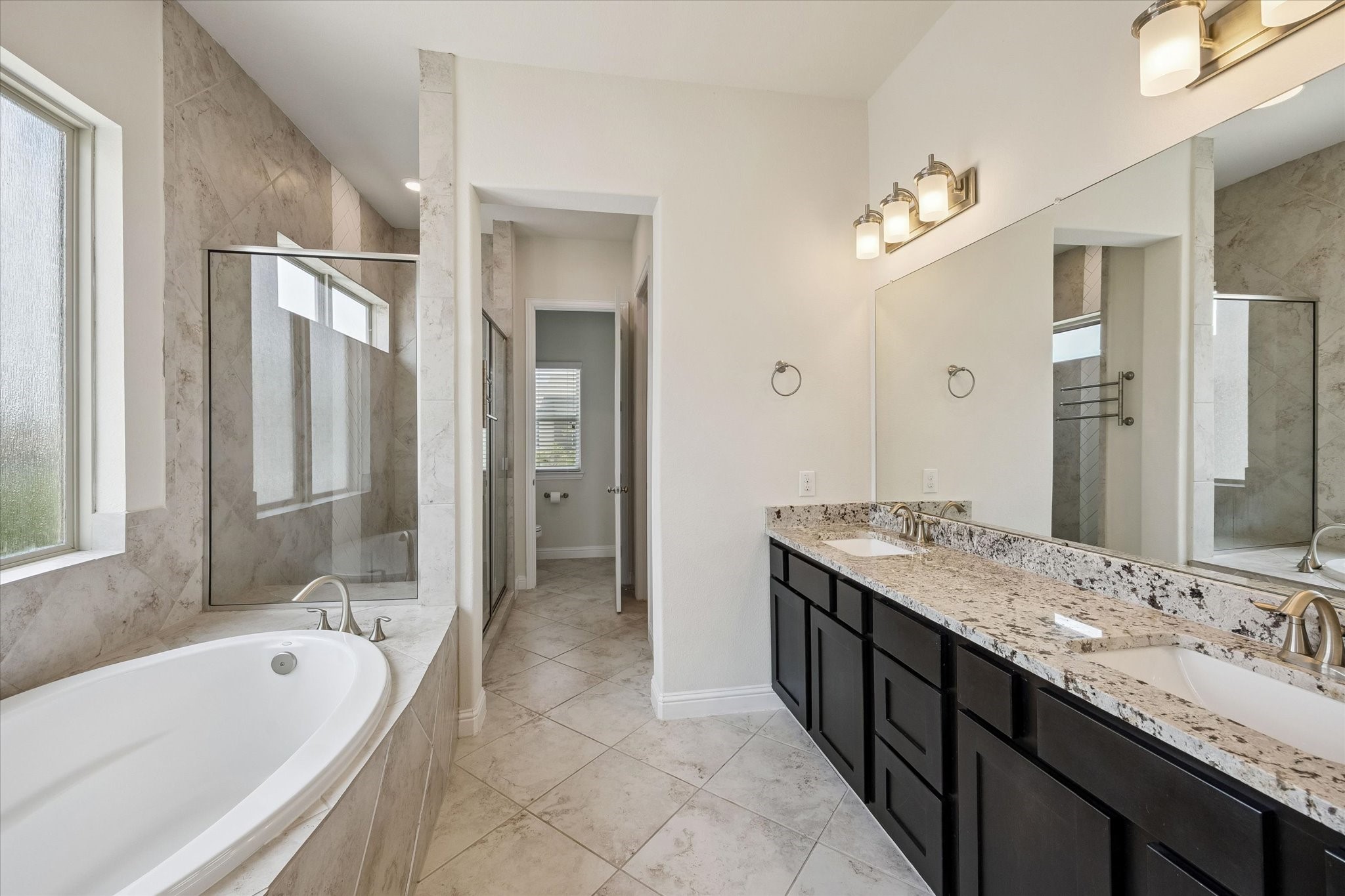 1764 Trinity Bend Drive Houston, TX 77080 - Photo 19 of 25 Spa-like bath with separate soaking tub and shower.