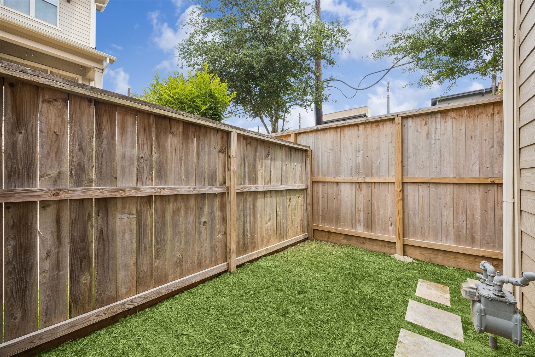1764 Trinity Bend Drive Houston, TX 77080 - Photo 22 of 25 This home has a small backyard since it sits on a corner lot. Great if you have a small dog.