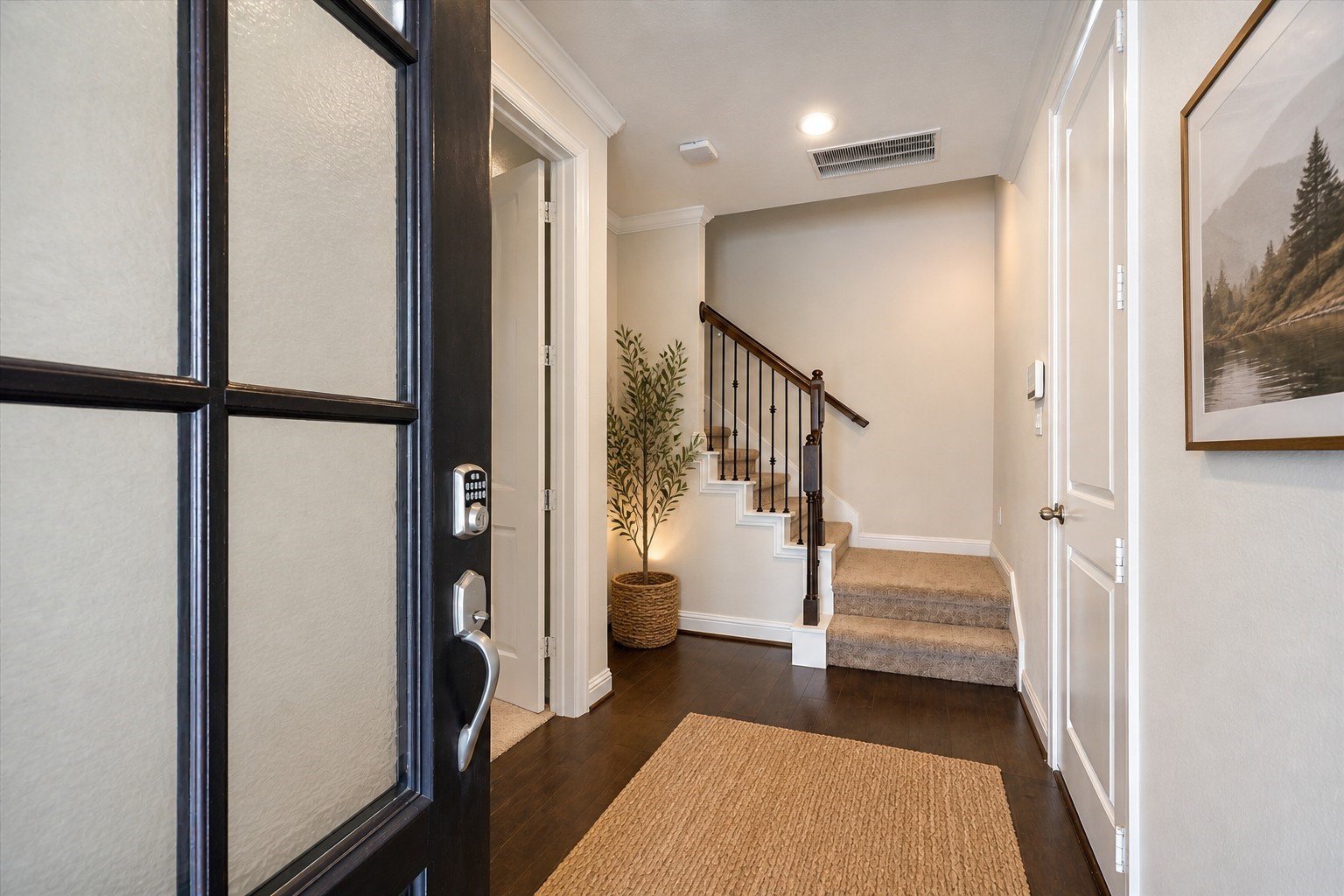 1764 Trinity Bend Drive Houston, TX 77080 - Photo 4 of 25 Entry into the first floor. Entry to the private 2-car garage is just to the right of the stairs. Virtually enhanced.