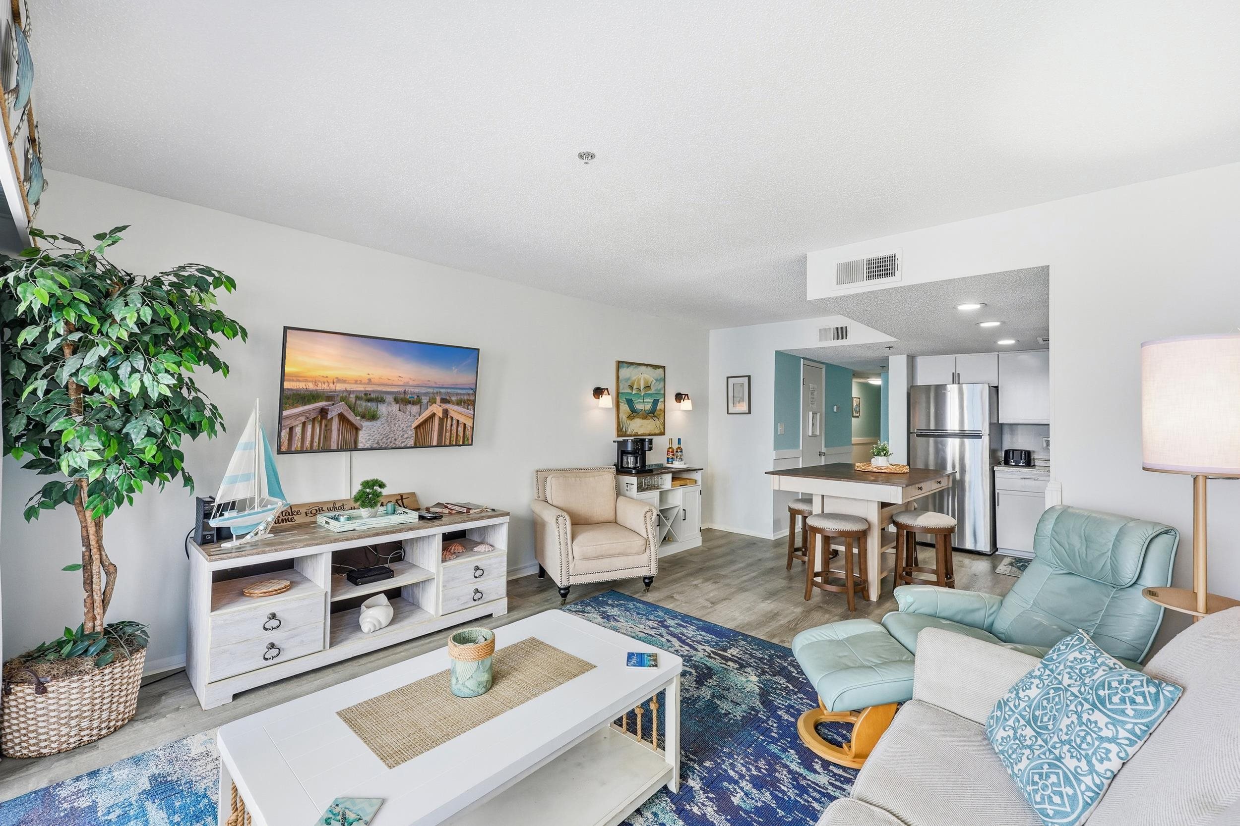 920 North Waccamaw Drive, Unit 2305 Murrells Inlet, SC 29576 - Photo 19 of 40 Living room with wood finished floors and recessed lighting