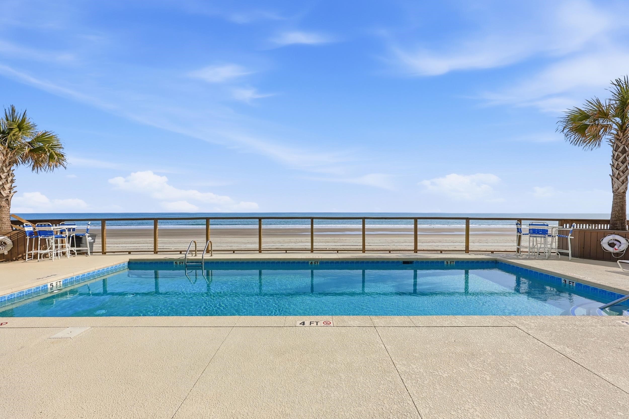 920 North Waccamaw Drive, Unit 2305 Murrells Inlet, SC 29576 - Photo 31 of 40 Community pool with a patio and a water view