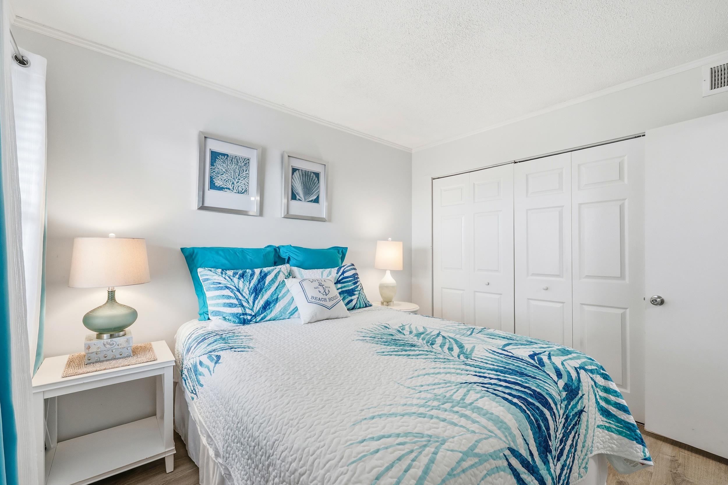 920 North Waccamaw Drive, Unit 2305 Murrells Inlet, SC 29576 - Photo 5 of 40 Bedroom featuring ornamental molding, a closet, wood finished floors, and a textured ceiling