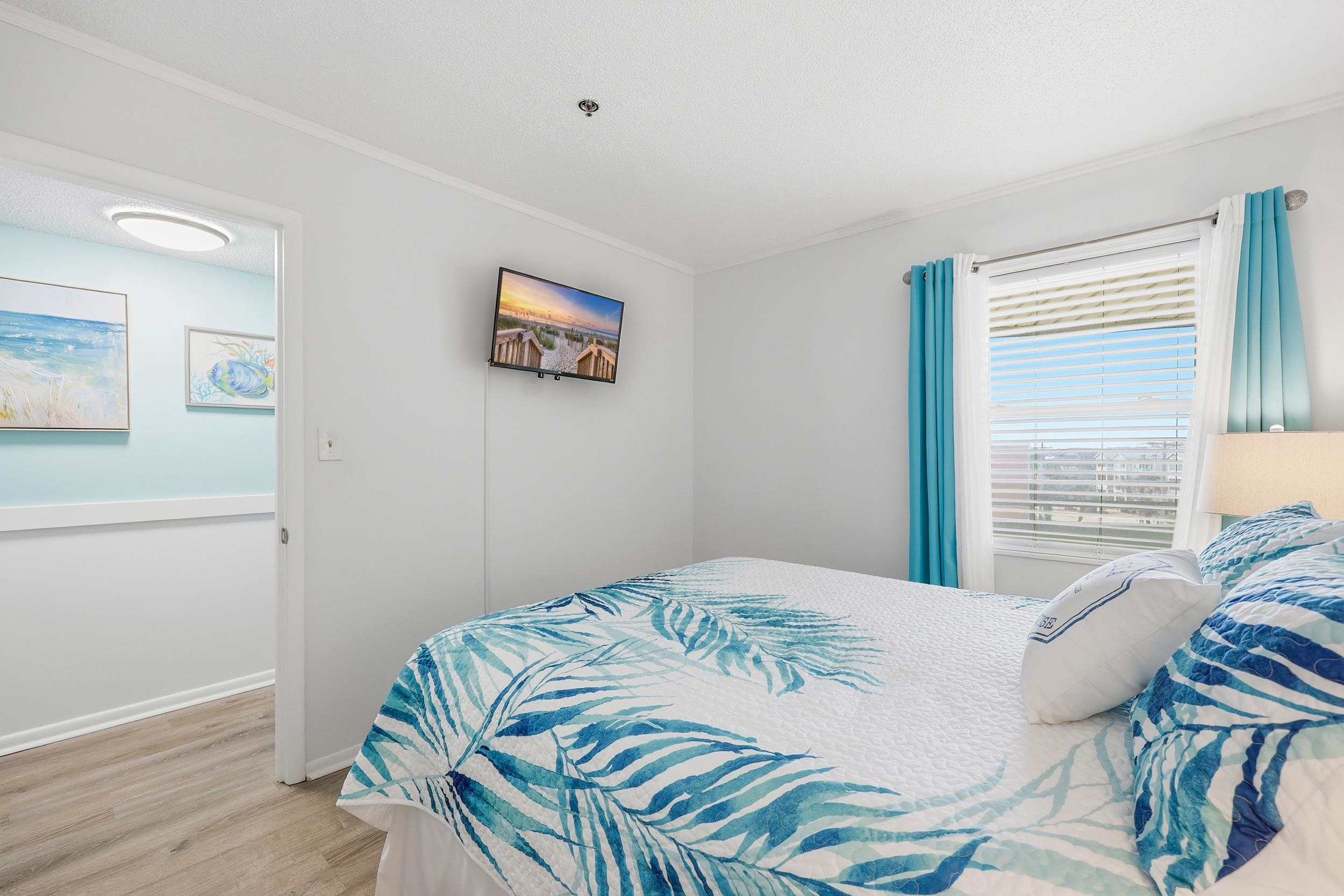 920 North Waccamaw Drive, Unit 2305 Murrells Inlet, SC 29576 - Photo 6 of 40 Bedroom with light wood finished floors and crown molding