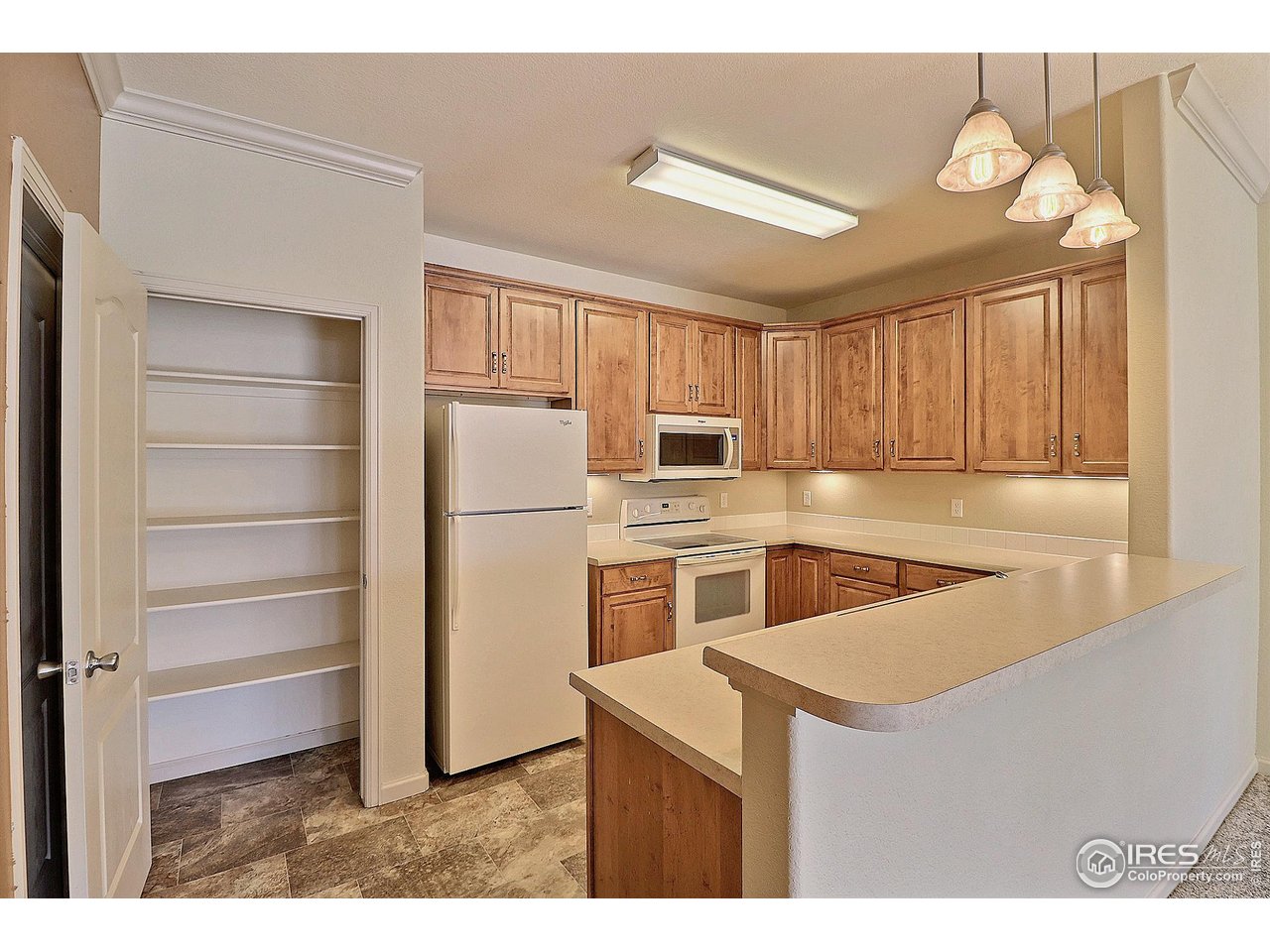 6607 West 3rd Street, Unit 1202 Greeley, CO 80634 - Photo 10 of 33 Awesome Kitchen with Closet Style Pantry