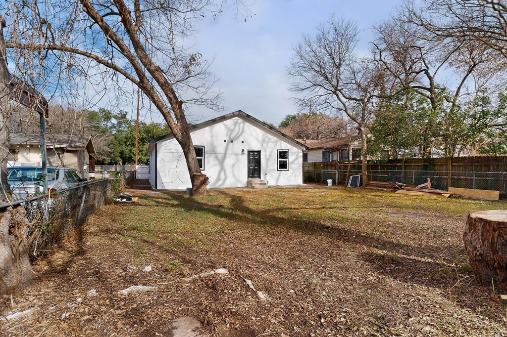 5650 Forney Road Dallas, TX 75227 - Photo 36 of 39 a view of a house with a yard