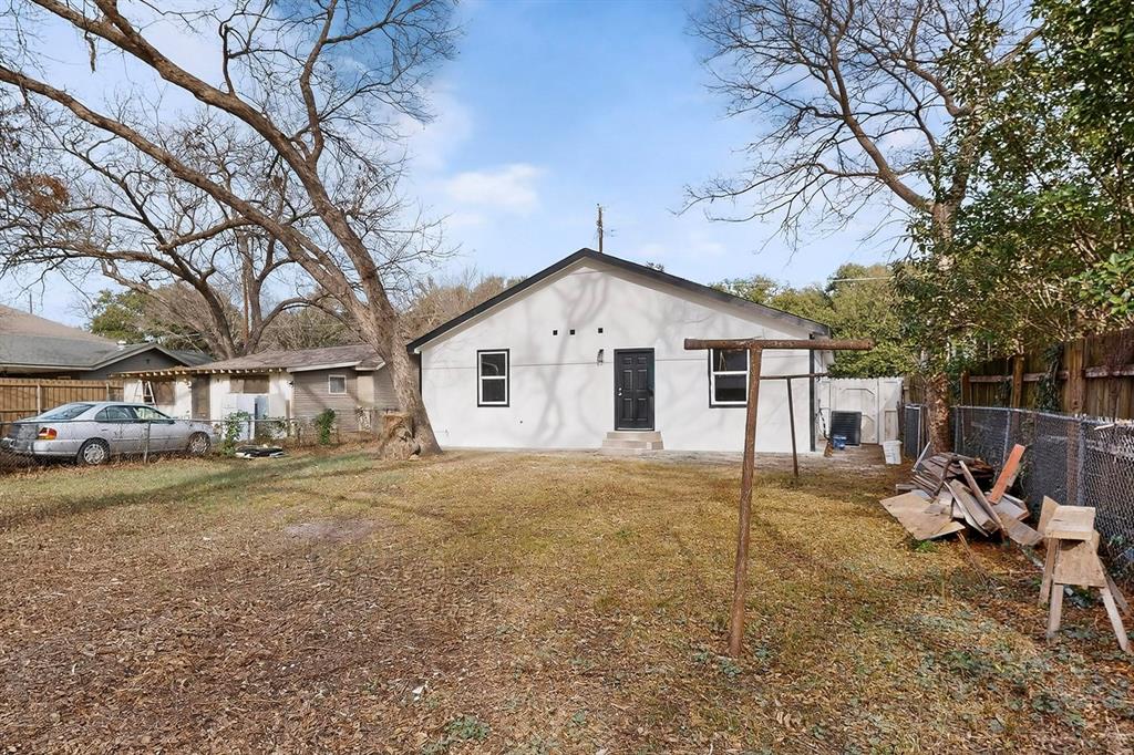 5650 Forney Road Dallas, TX 75227 - Photo 37 of 39 a view of a house with a yard covered in snow
