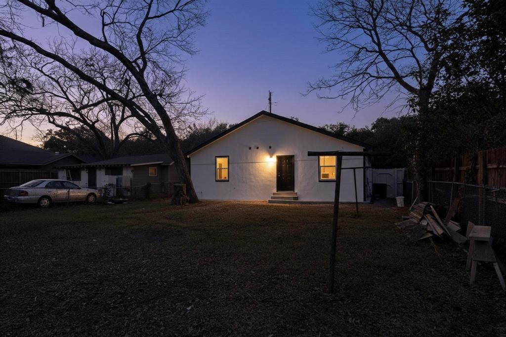 5650 Forney Road Dallas, TX 75227 - Photo 38 of 39 a front view of a house with a yard