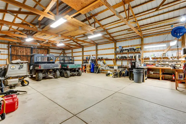 a view of parking garage with cars